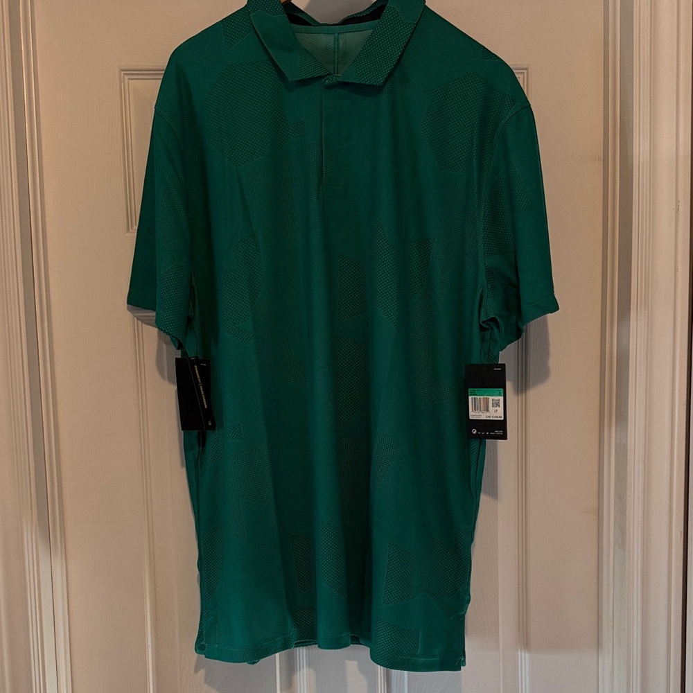 Nike drifit Tiger Woods golf shirt size XL 
New with the tags